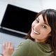 Fotolia_17763099_S.jpg (Attractive young female using a laptop)